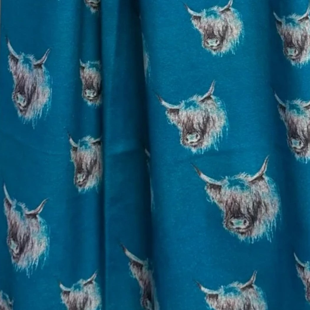 Electric Blue coloured pashmina with Monochromatic Highland cow heads on