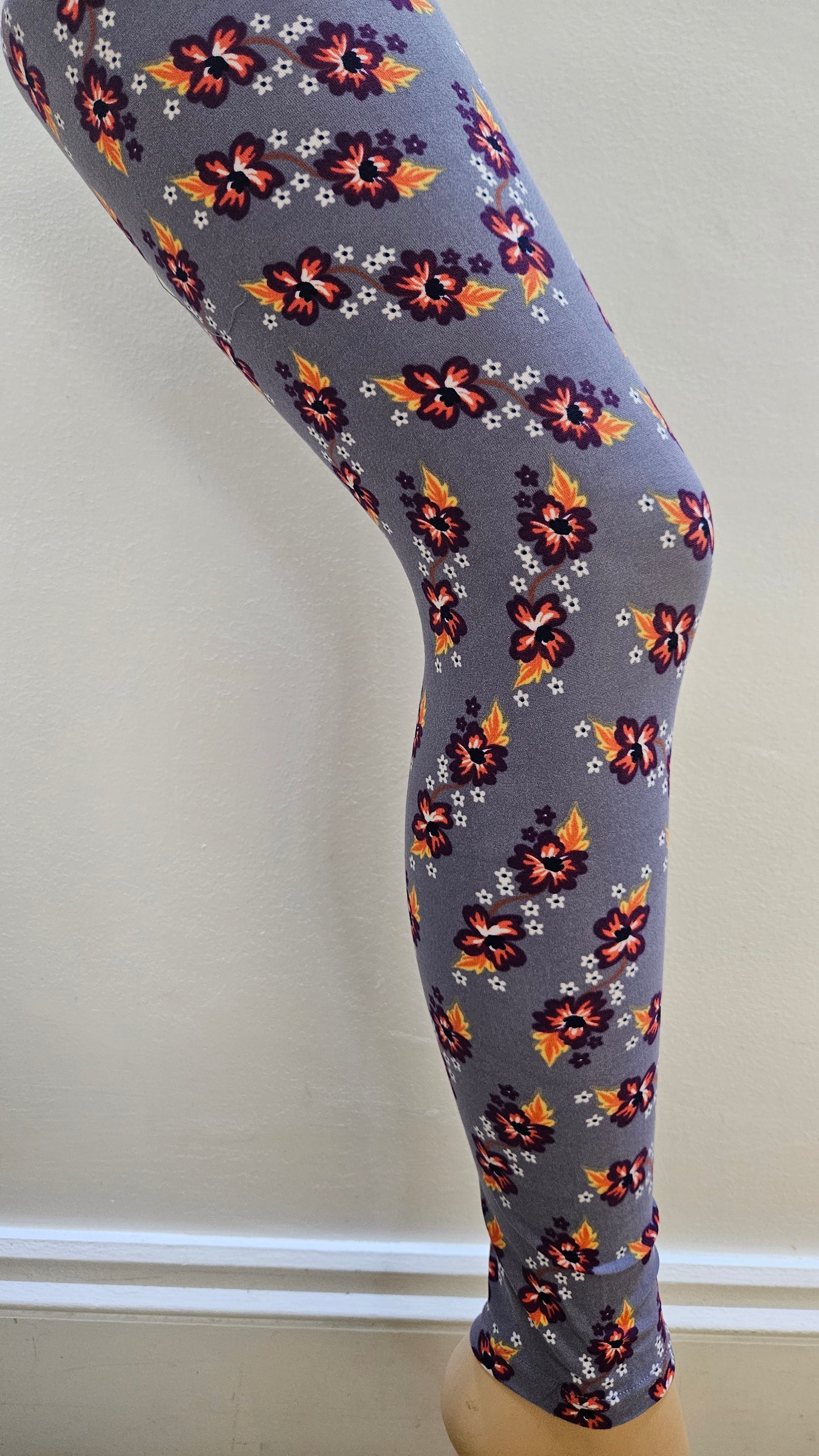 Floral-patterned leggings on a white background