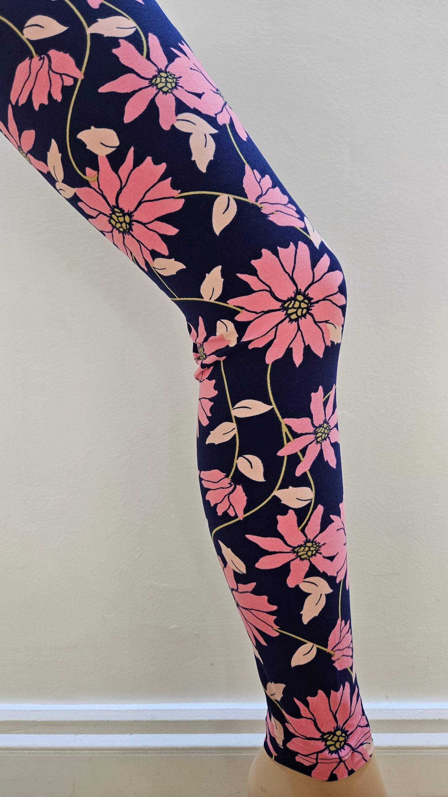 Floral-patterned legging on a white background