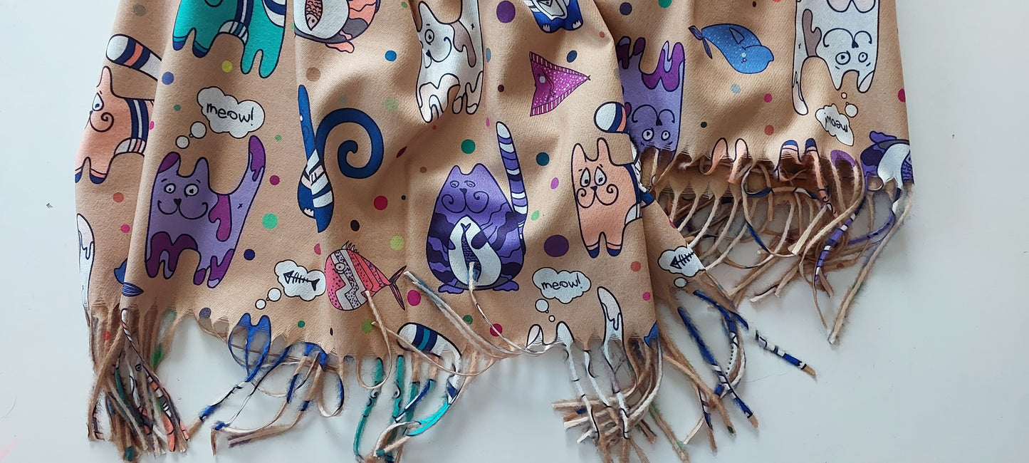 Colourful scarf with cat patterns on a white background
