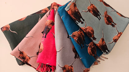 Array of brown Highland cow pashminas in 6 colours on a white background 