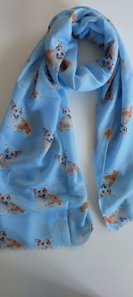 Blue scarf with corgi dog pattern on a white background
