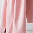 Pink fabric scarf on a white background