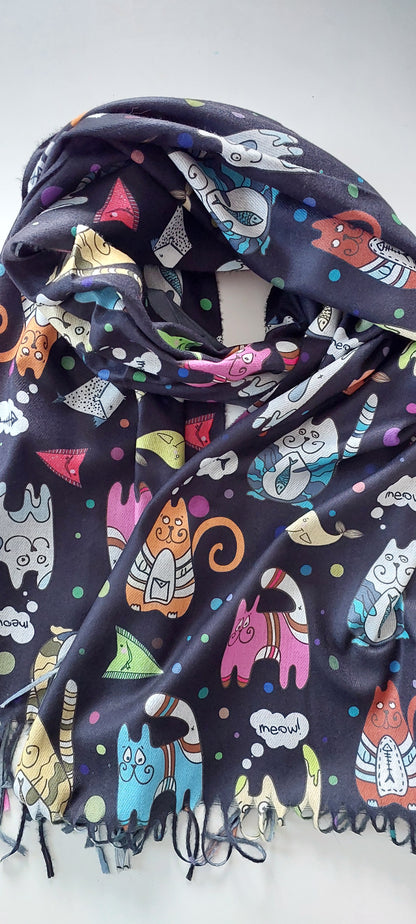 Colorful cat-patterned pashmina on a white background