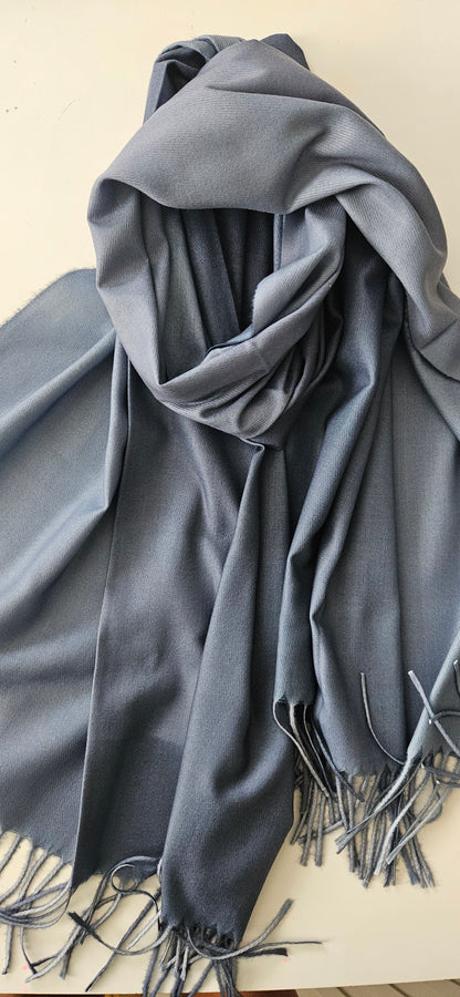 Blue Two Toned scarf with tassels on a white background