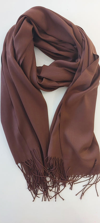 Brown scarf with fringes on a white background