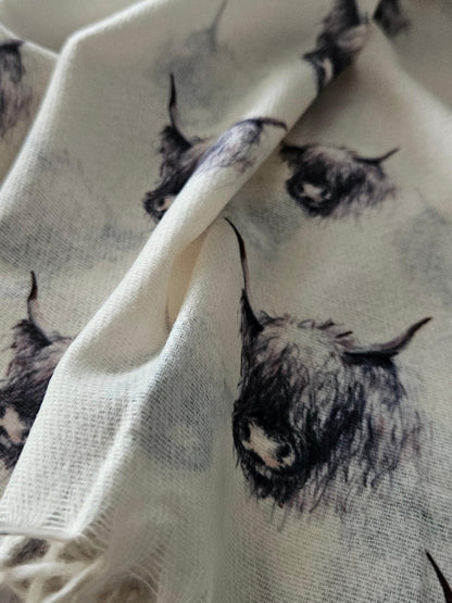 Close-up of cream black & white highland cow pattern