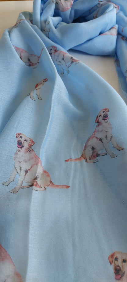 Close-up of light blue fabric with Labrador dog pattern
