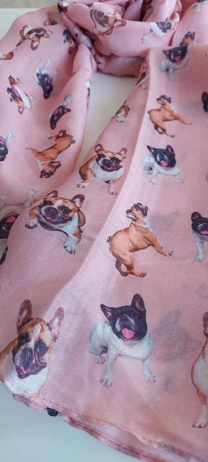 Pink fabric with dog pattern on a light pink background