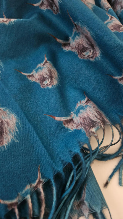 Blue pashmina with black and white Highland Cow print and tassels