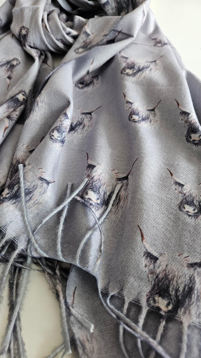 Close up of Grey coloured pashmina with Monochromatic Highland cow heads on