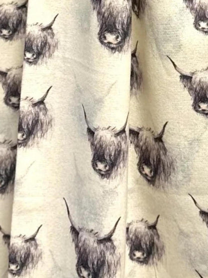 Cream coloured pashmina with Monochromatic Highland cow heads on