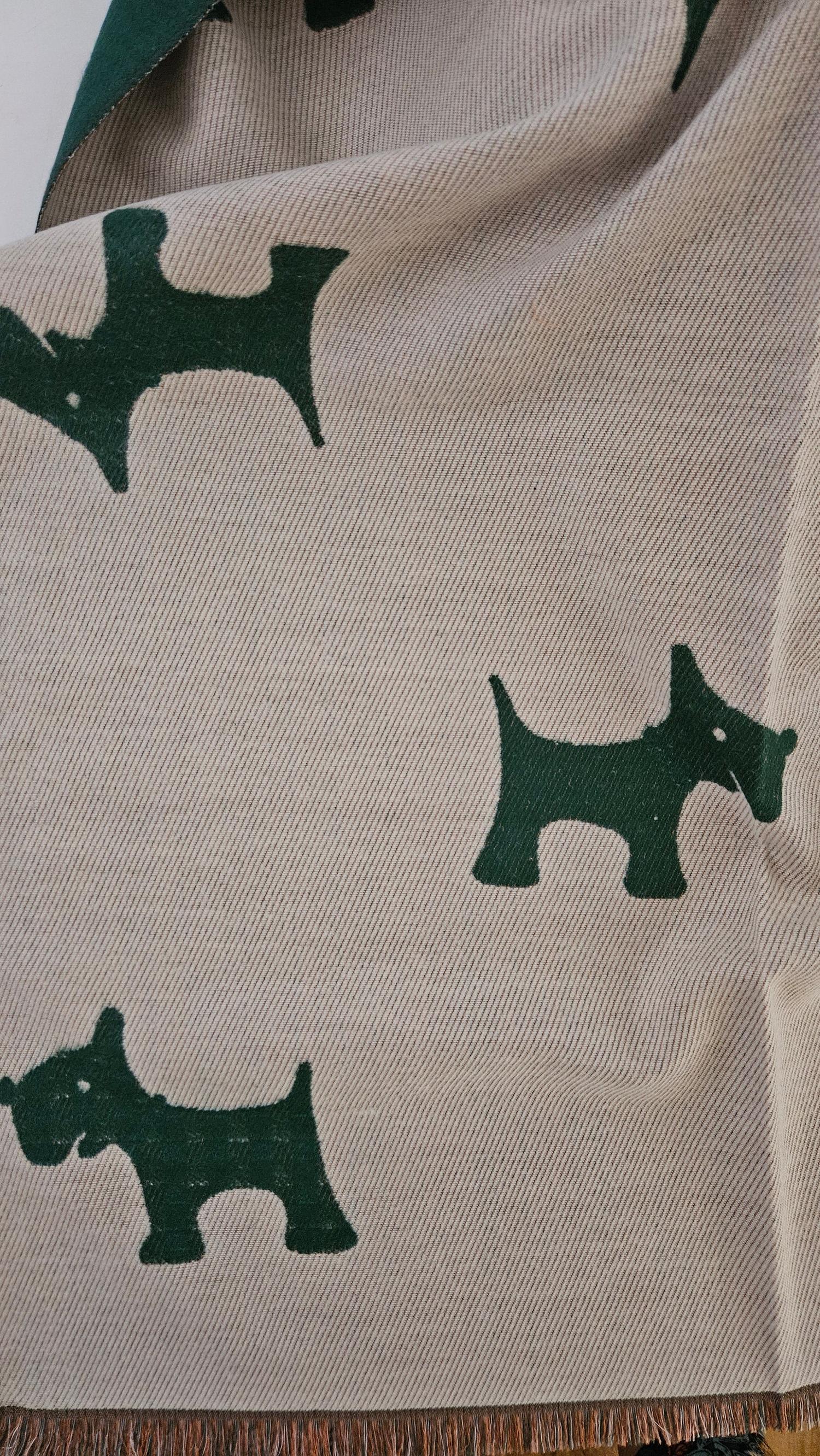 Scarf with green Scotty Dog patterns on a beige background