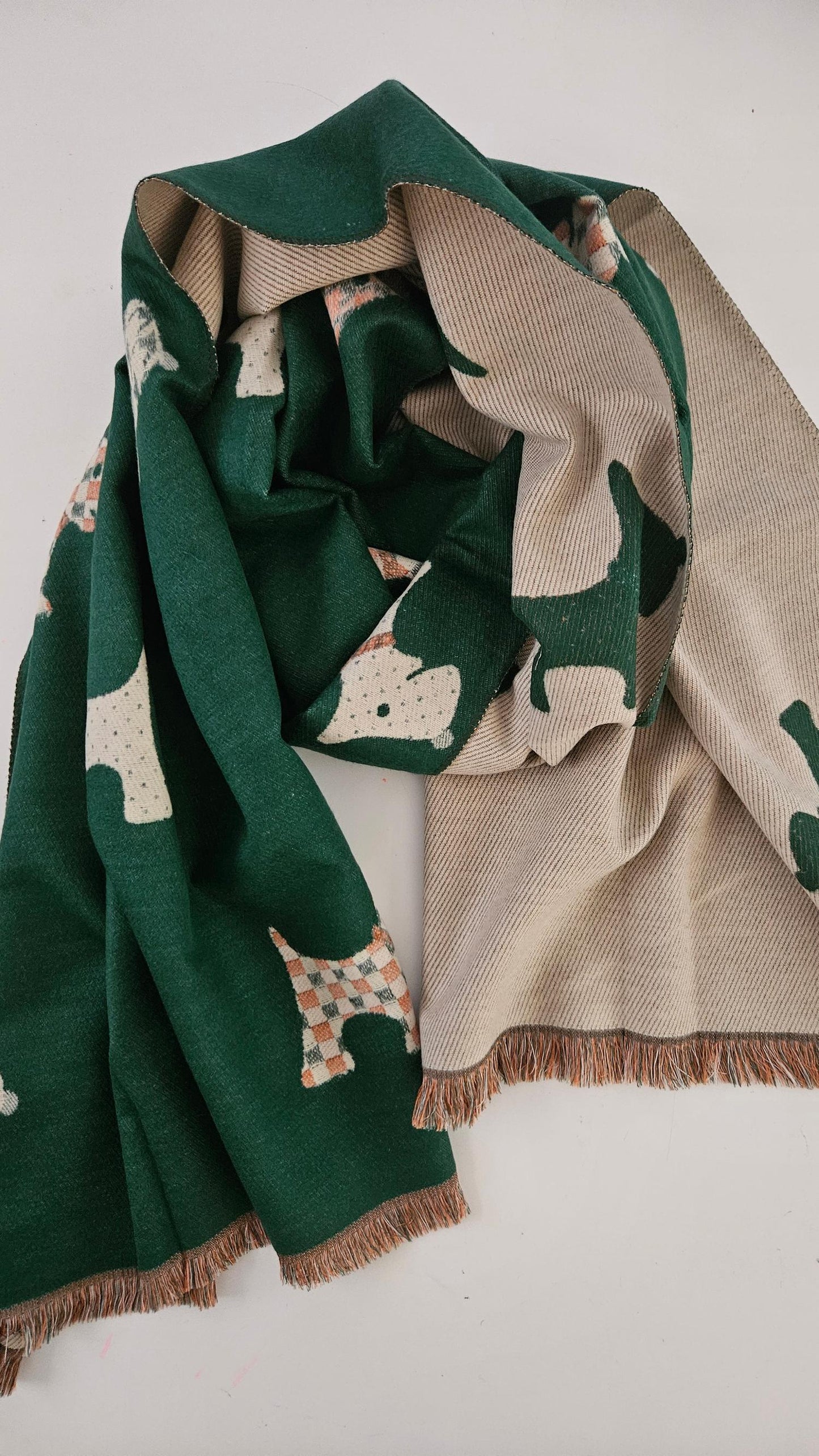Green and beige scarf with Scotty Dog patterns on a white background