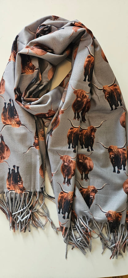 Grey scarf with longhorn highland cattle pattern on a white background