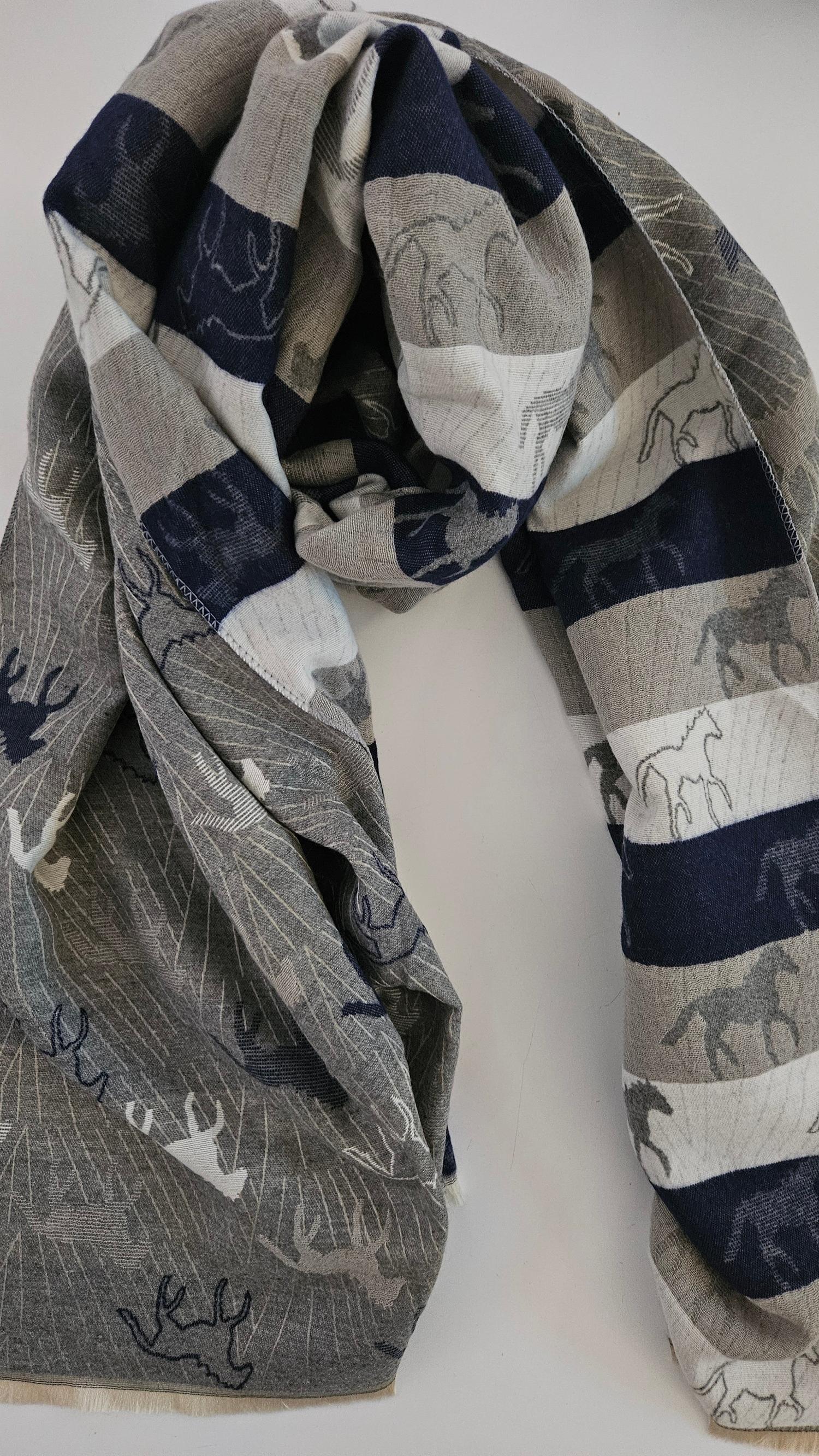 Grey, white and navy scarf with horse pattern on a white background