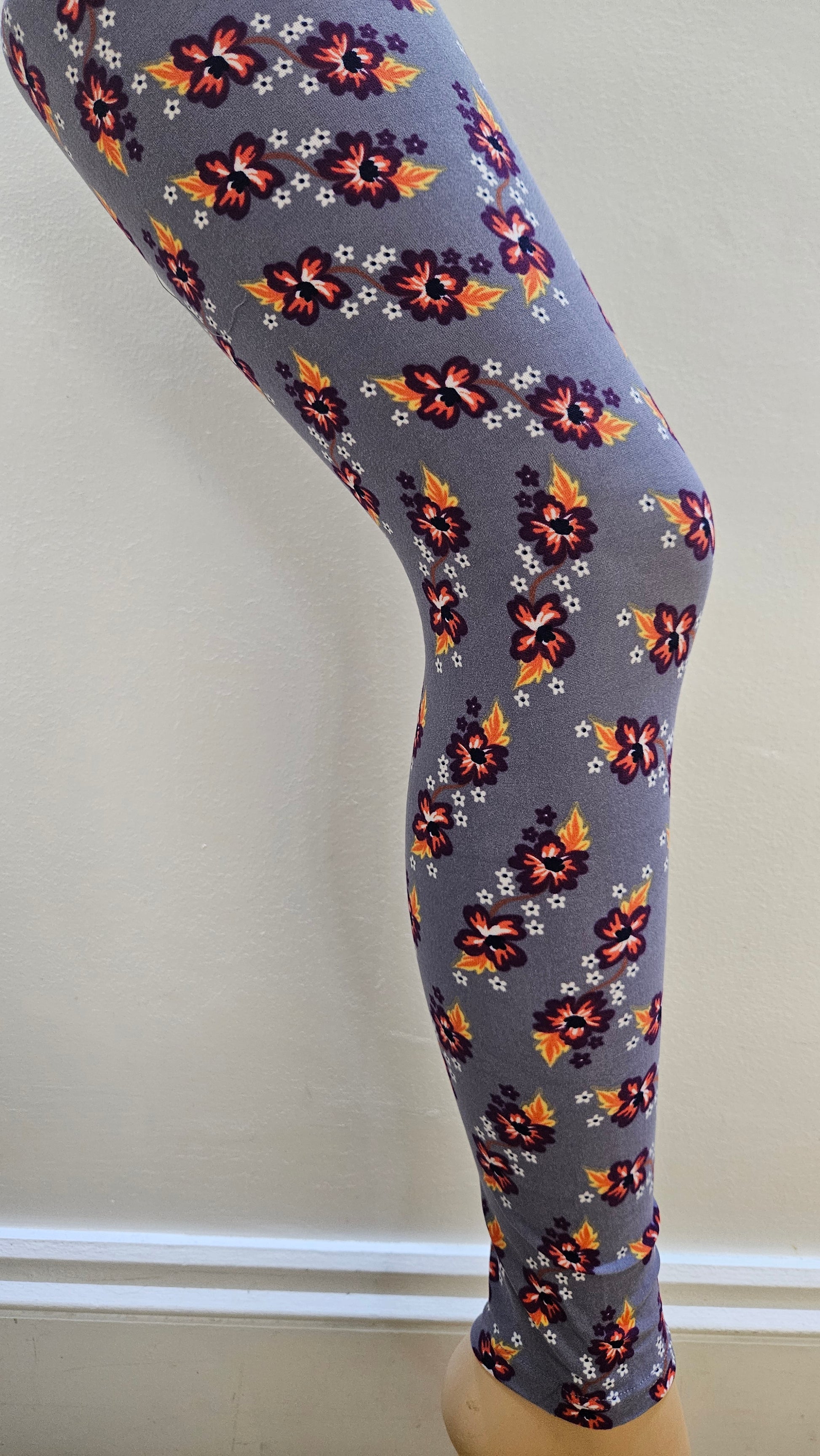 Floral-patterned leggings on a white background