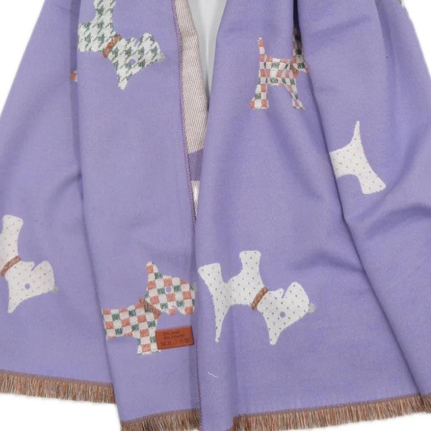 Purple pashmina with Scotty Dog patterns on a white background