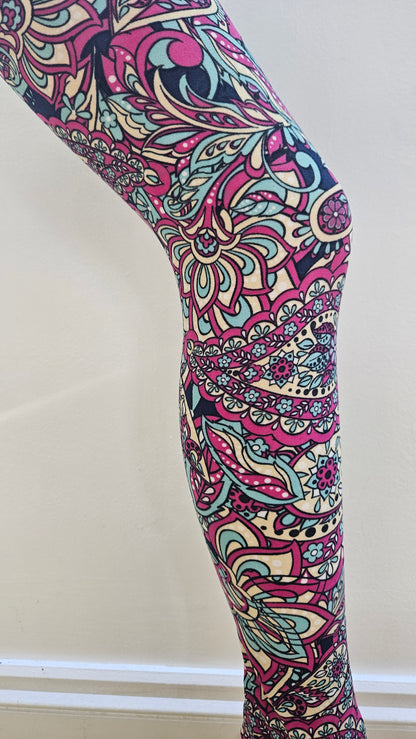 Colorful patterned leggings on a white background