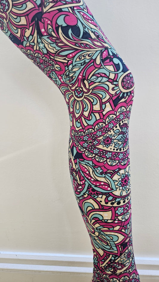Colorful patterned leggings on a white background