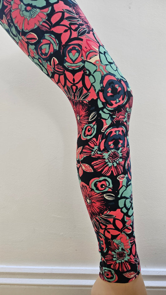 Floral-patterned leggings on a white surface