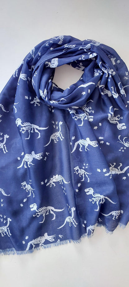 Navy Blue scarf with white dinosaur pattern on a white background