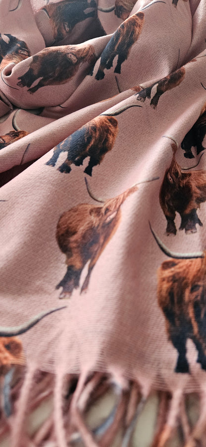 Scarf with a pattern of highland cow on a pink background