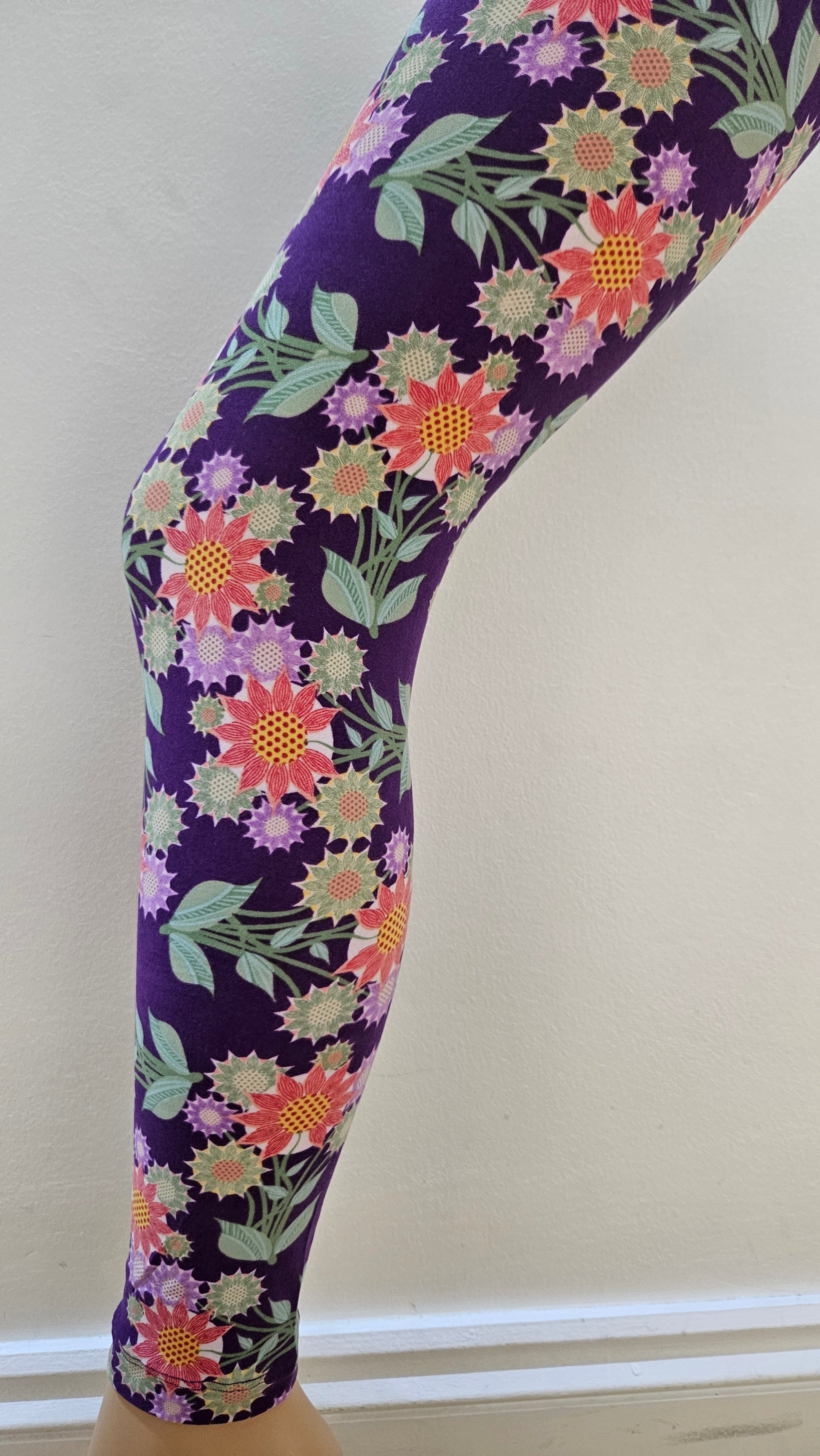 Floral-patterned leggings on a white background