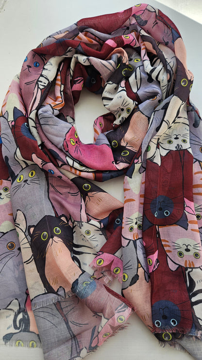Scarf with red and grey cats on it