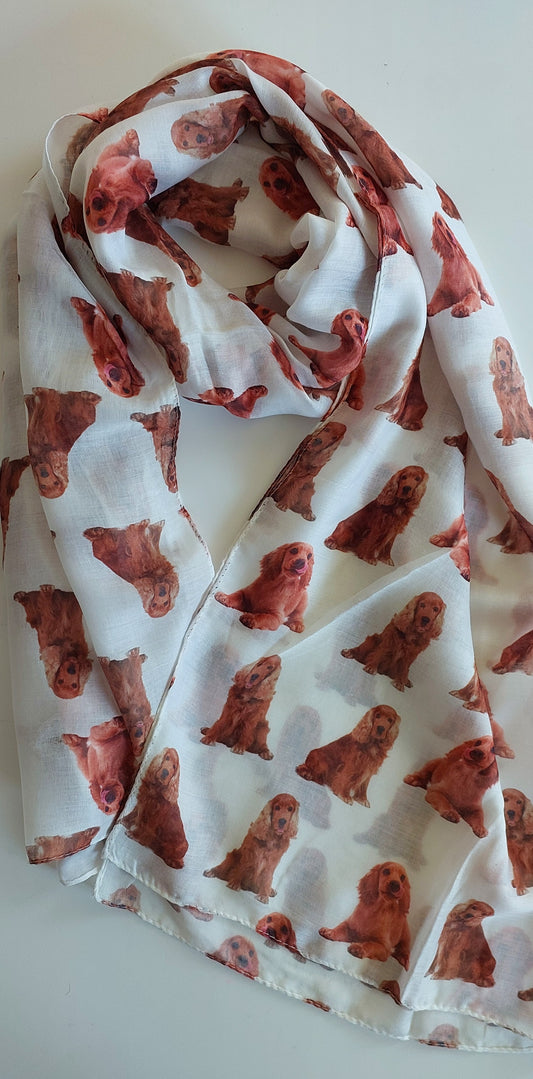 White Shimena scarf with tan cocker spaniels all over it, laid flat on a white background