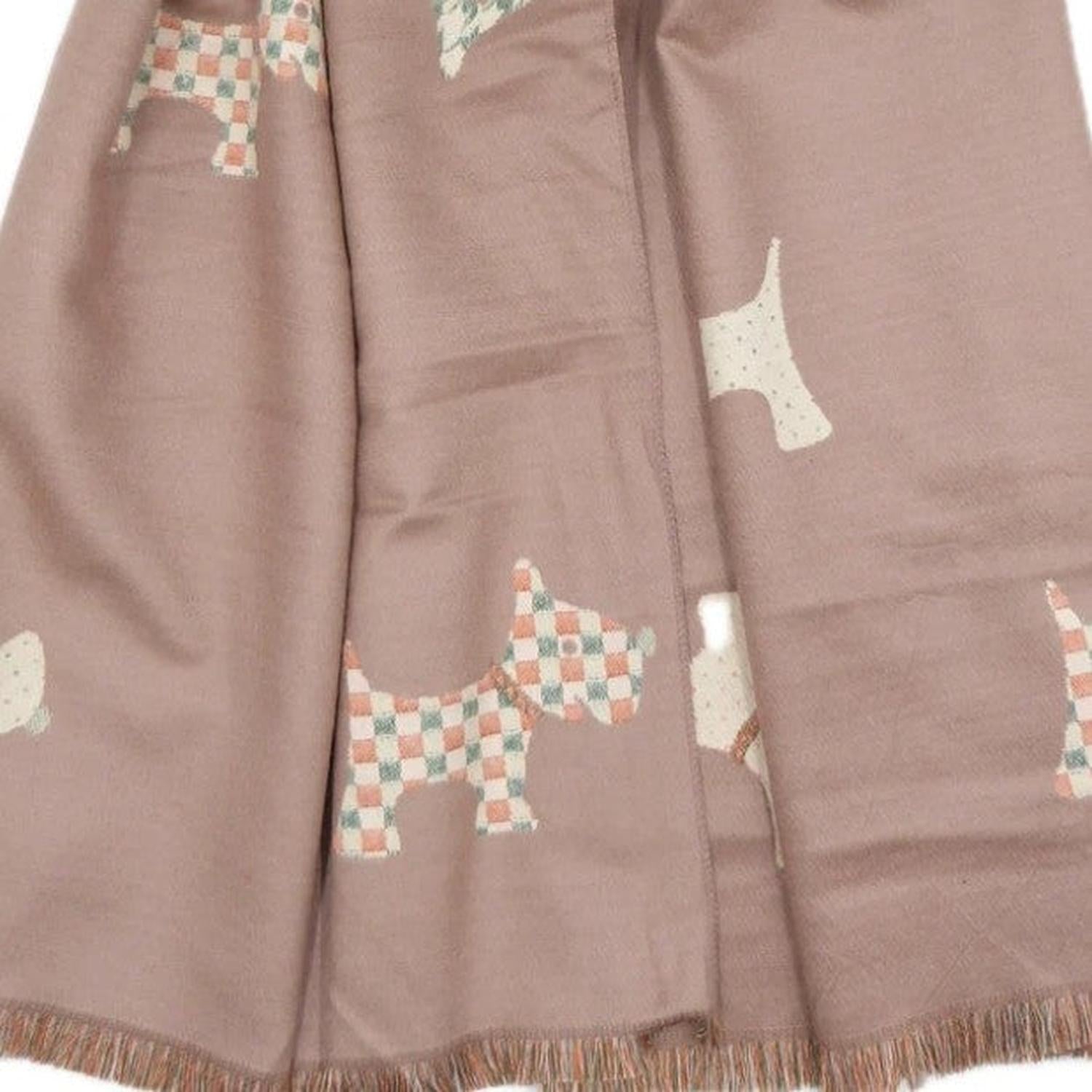 Brown fabric with Scotty Dog  patterns on a white background