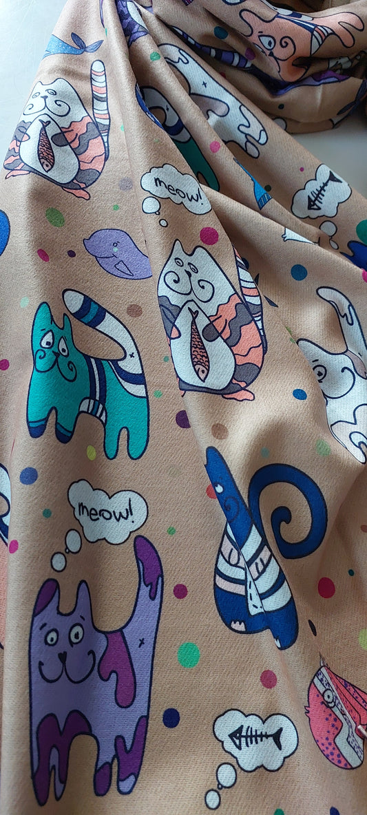 Pashmina with colourful cat illustrations and polka dots on a taupe background