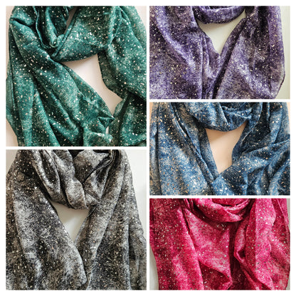 Collage of glittery scarves in various colours on a white background